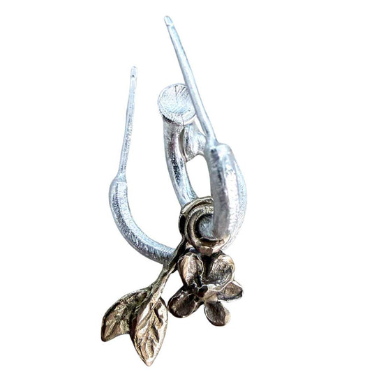 Mixed metal Plum Blossom & Leaf earring charms in manganese bronze on textured sterling silver hoops by HerbertandWilks Jewellery. This handcrafted local Auckland jewellery piece is shown on a white background.