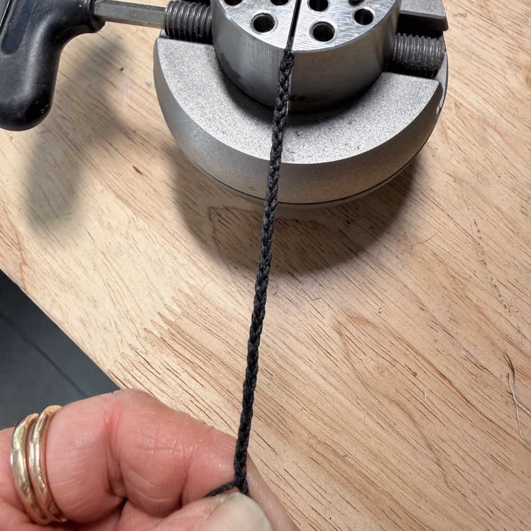 Plaiting cord for the Wrapped Beaded Necklace, showing construction process and finishing detail