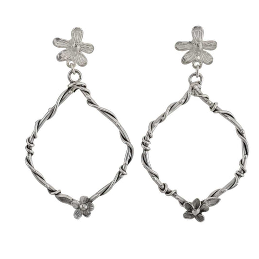 Handcrafted sterling silver interwoven flora statement earrings featuring flower studs and organic twisted vine hoops - HerbertandWilks botanical jewellery