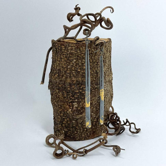 Wrapped Keum-Boo earrings hanging to show length