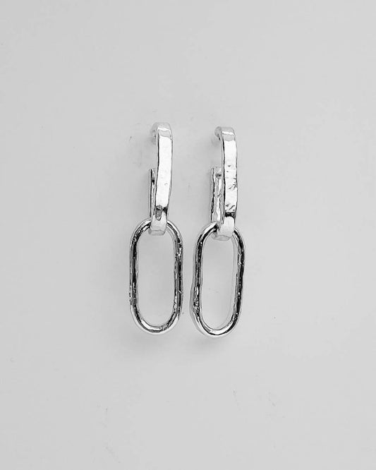 A pair of Long link chain earrings in sterling silver showing the front profile