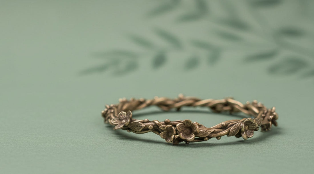 Bronze interwoven floral bangle used as header image for bronze jewellery care guide
