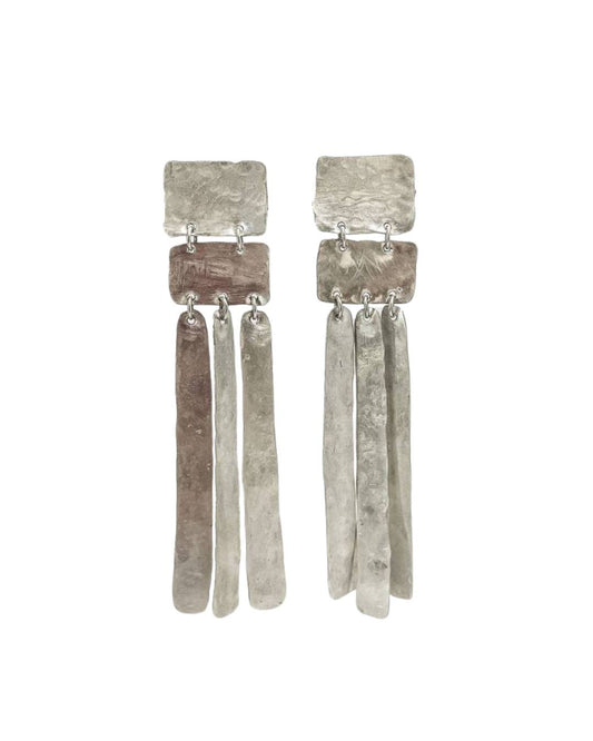 A pair of Sterling Silver long earrings with three layers that move independently - hand textured to create a unique surface to the silver