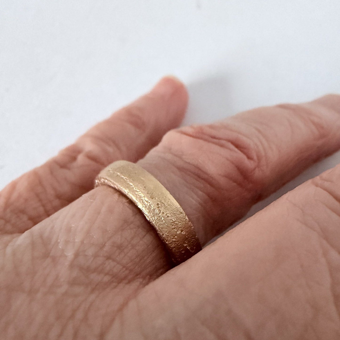 mm Sandcast Ring – Flat Face in 9ct Yellow Gold worn on hand, showing organic sandcast texture and everyday wearability — HerbertandWilks Jewellery