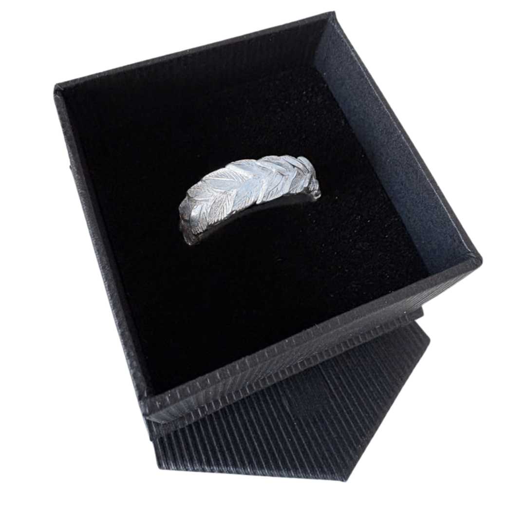 Sterling silver botanical wedding band presented in black ring box, hand-forged laurel leaf design made in New Zealand