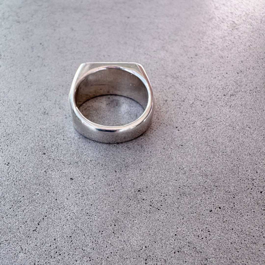 Sterling silver Eden Signet Ring rear view overhead angle, highlighting tapered band width and handcrafted finish