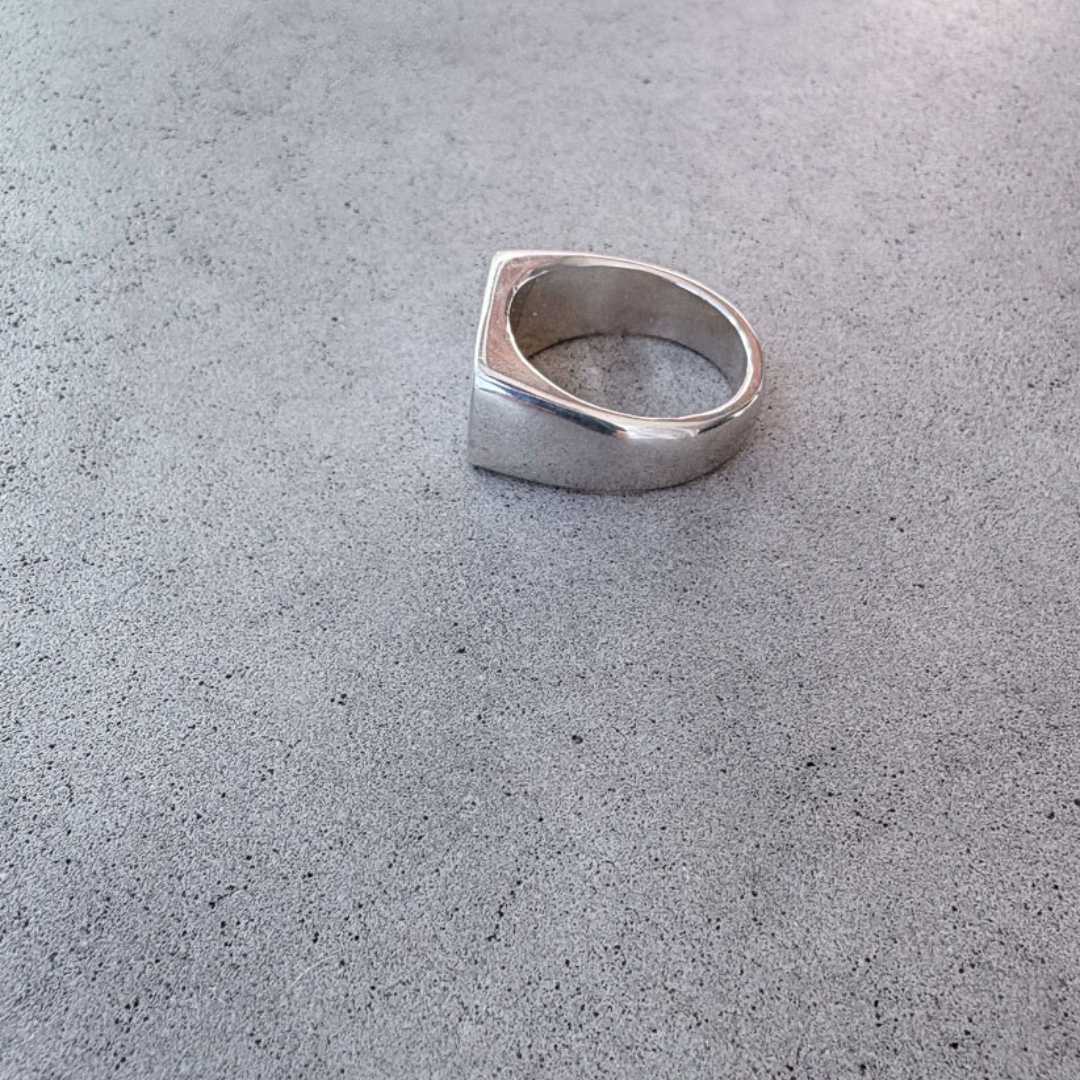 Eden Signet Ring side profile showing tapered sterling silver band from 5mm, downward angle view