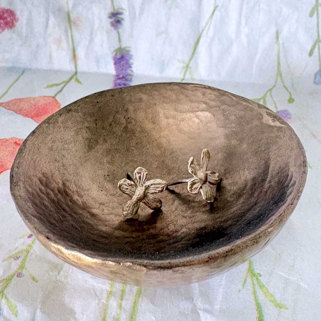 Flora Stud Earrings - 9ct yellow gold flower studs on green tulle ribbon with floral paper background - spring styling