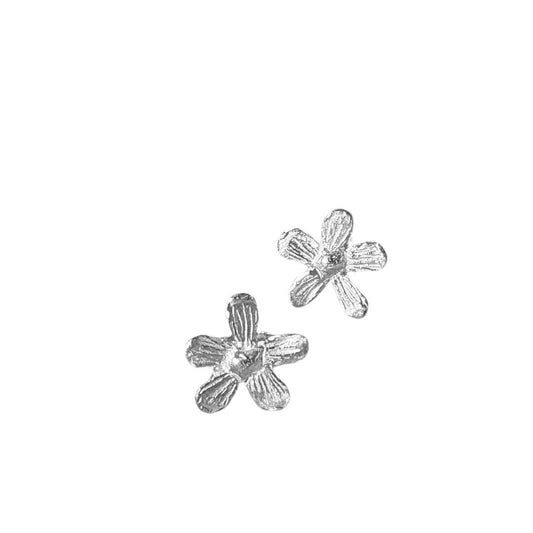 Flora sterling silver flower stud earrings pair on white background, handmade botanical jewellery