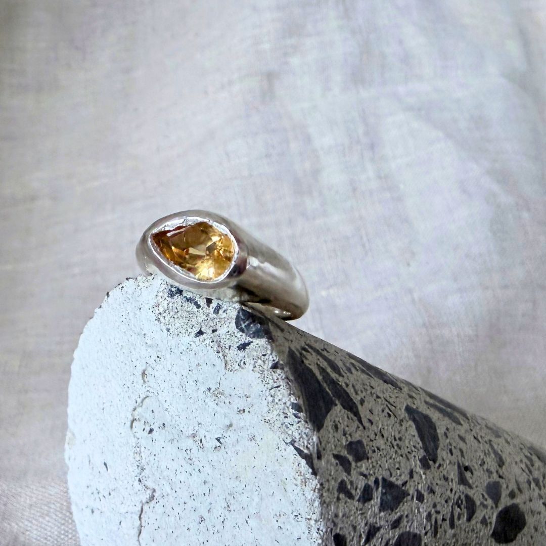 Kōwhai Signet Ring with pear-cut natural citrine in a sculptural sterling silver setting