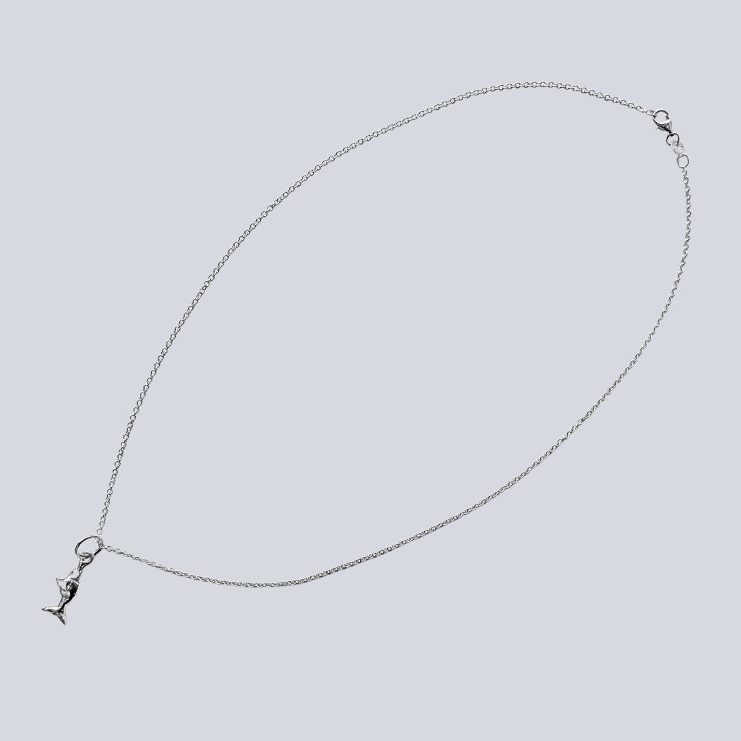 Mini Chomp sterling silver fish pendant on 45cm round cable link chain, shown laid flat.
