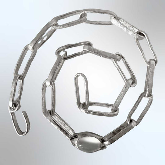 45cm sterling silver paperclip chain necklace laid in a spiral on a grey background — showing full chain length and link scale — HerbertandWilks