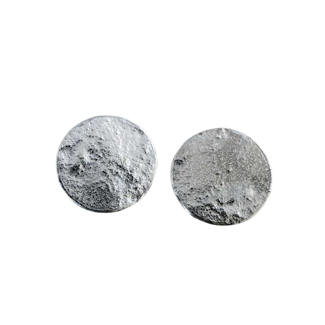 Front view of the 15mm sterling silver Sequin Disc Stud Earrings on a crisp white background, showcasing their clean circular silhouette and hand-reticulated textured finish.