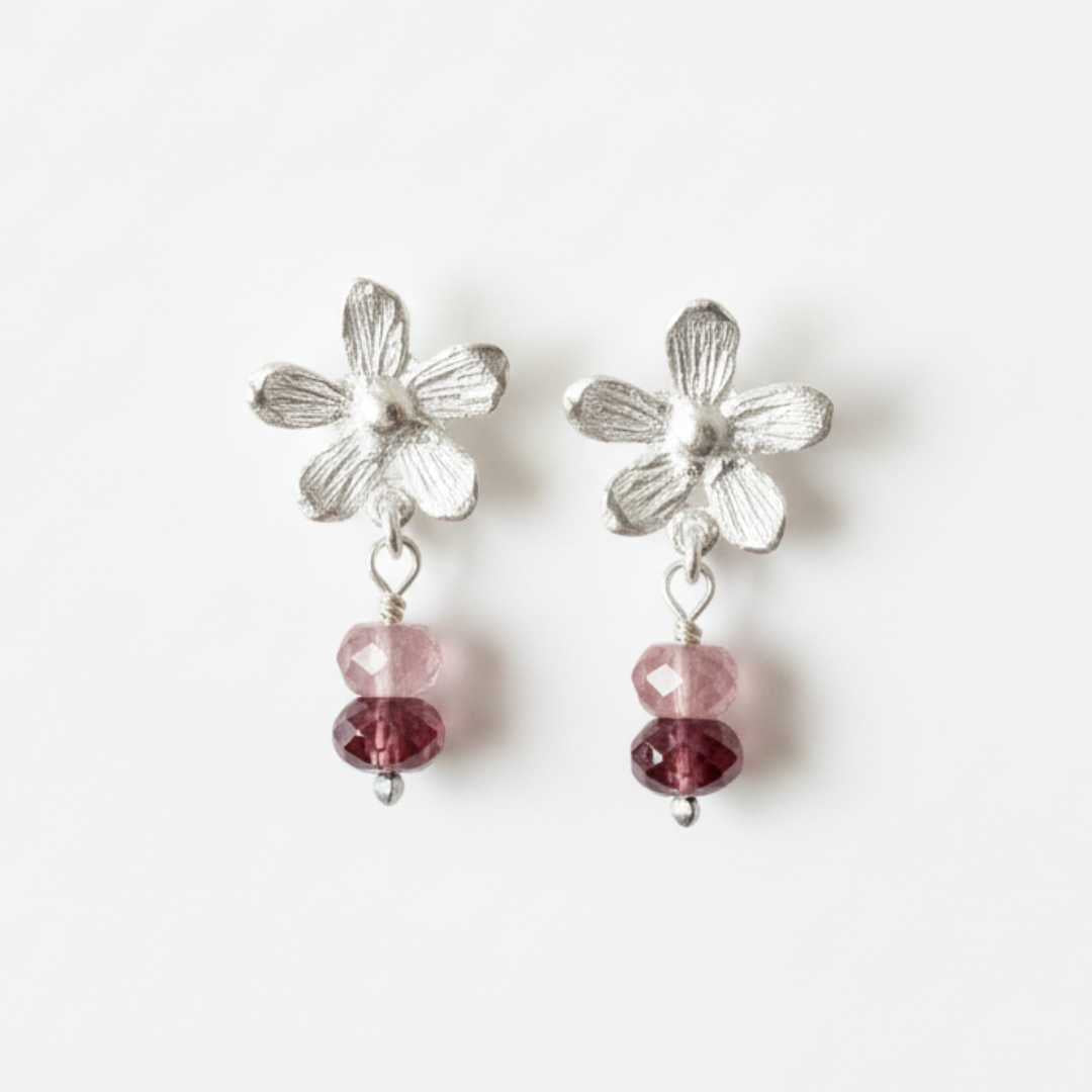 Flora Drop Earrings with Pink Tourmaline – sterling silver botanical flower earrings with natural pink tourmaline gemstones on white background