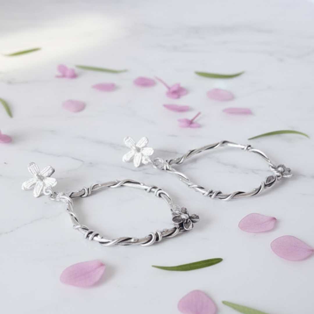 Sterling silver interwoven flora statement earrings with scattered pink blossoms and botanical styling - handmade wedding earrings New Zealand