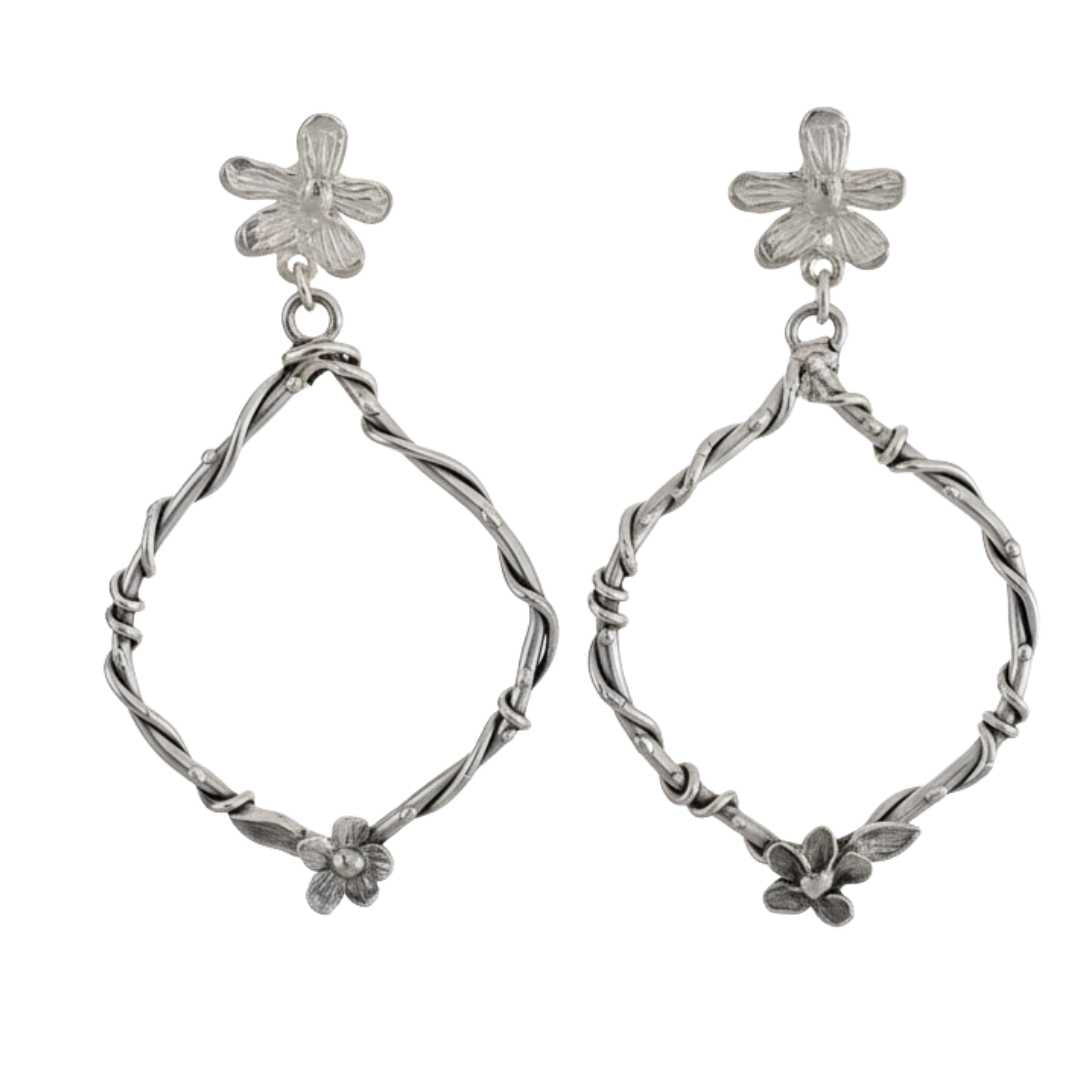 Handcrafted sterling silver interwoven flora statement earrings featuring flower studs and organic twisted vine hoops - HerbertandWilks botanical jewellery