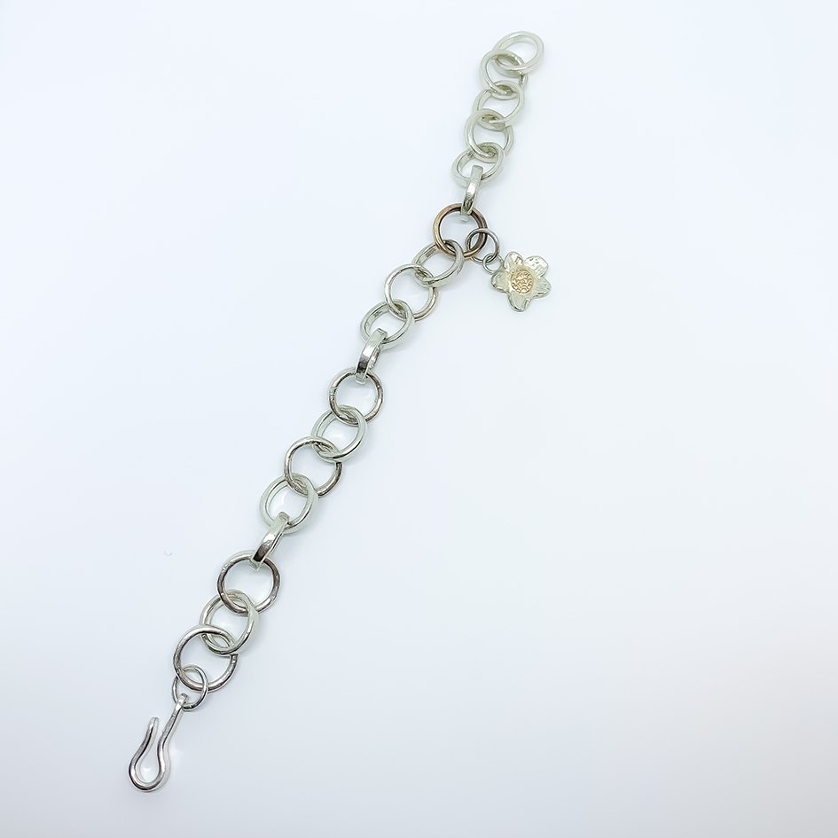 Elixir Chain Elixir Chain Bracelet with Alpine Daisy Charm – Sterling Silver ...