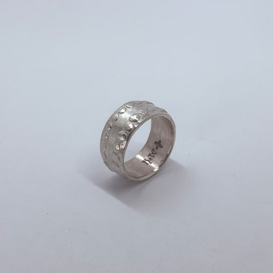 Sterling Silver Unisex Ring with an organic texture creating a modern artefact