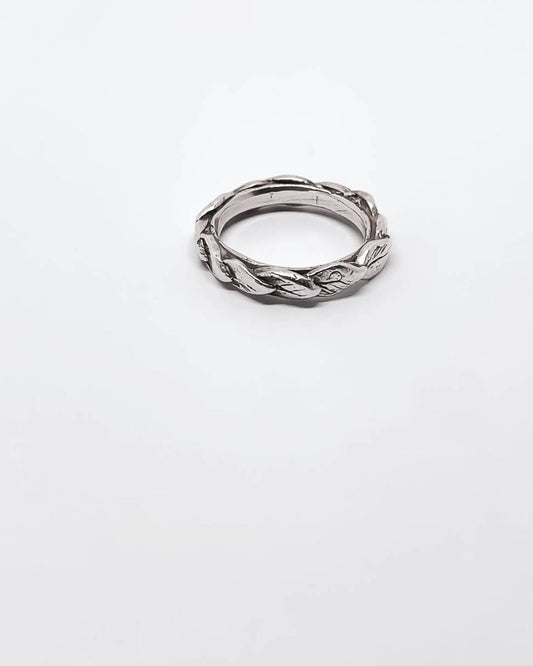 A Sterling Silver organic stacking ring formed by overlapping single leaves.