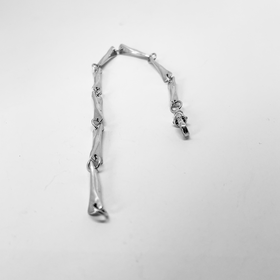 View of the Modernist Butterfly link chain bracelet